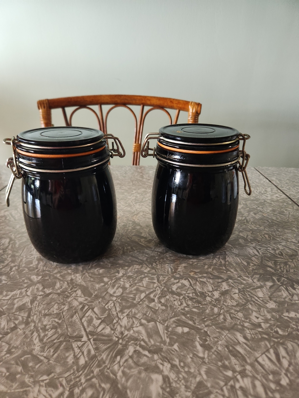 Source Unknown Black Ceramic Clamp-Top Storage Jars with Orange Seals